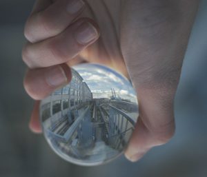 hand holding crystal ball 