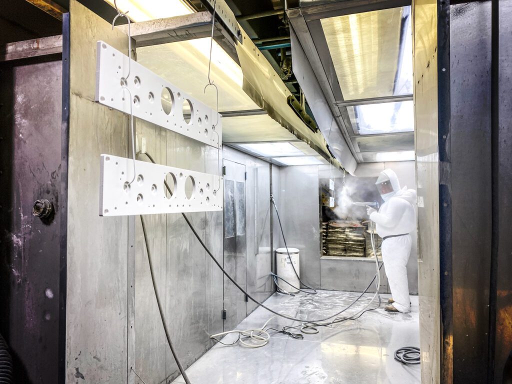 manual nordson powder coating line at evs metal new jersey